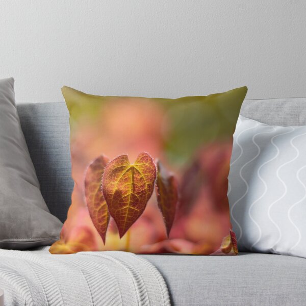 Item preview, Tiny orange young leaves during Spring. Bokeh in the background designed and sold by macroviewpoint.