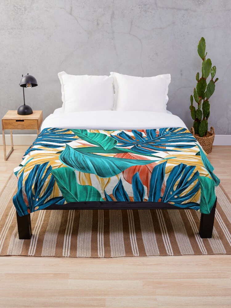 Tropical pattern green blue teal orange red and yellow print