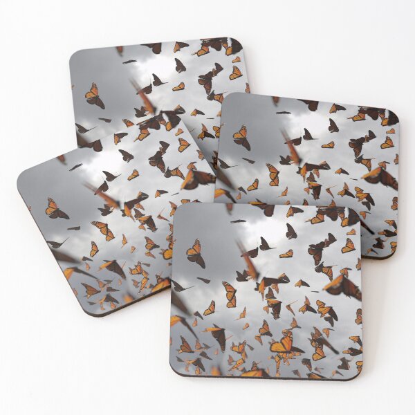 Item preview, group of monarch butterflies, Danaus plexippus swarm in front of dark clouds designed and sold by DottedYeti.