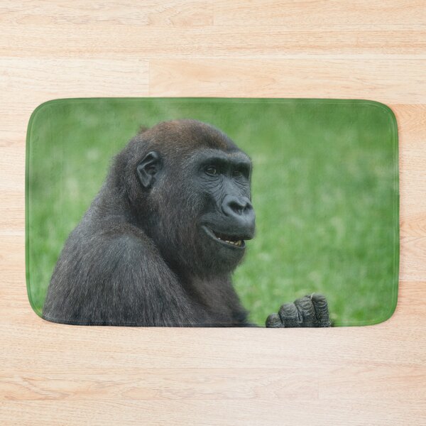 Item preview, Gorilla Lope Sitting In The Green Summer Grass designed and sold by rawshutterbug.