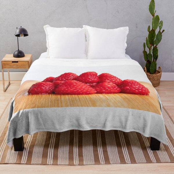 Item preview, Fresh red raspberry fruits stacked on wooden board designed and sold by krisgreenwood.