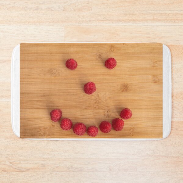 Item preview, Fresh red raspberry fruits aligned as smiley face photo designed and sold by krisgreenwood.