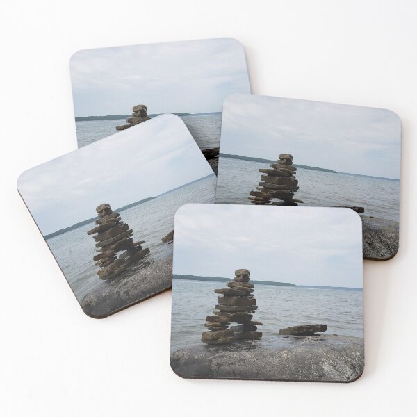 Item preview, Stone inukshuk on a rocky beach designed and sold by nfssmith.