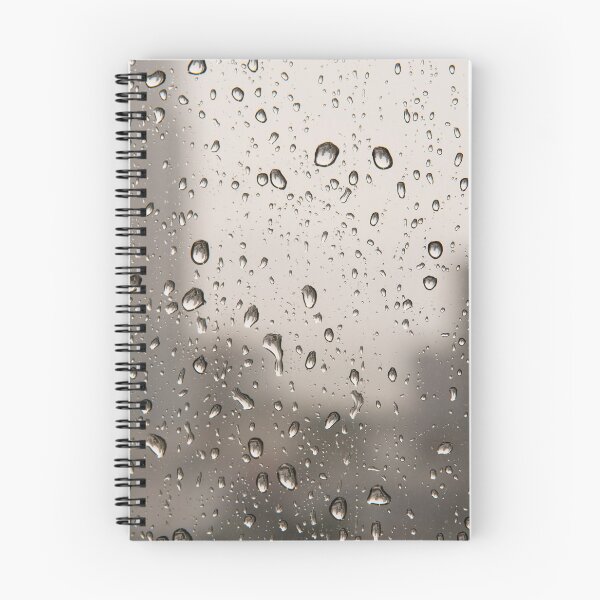 Item preview, Close up of drops of rain water running down clear glass window designed and sold by krisgreenwood.
