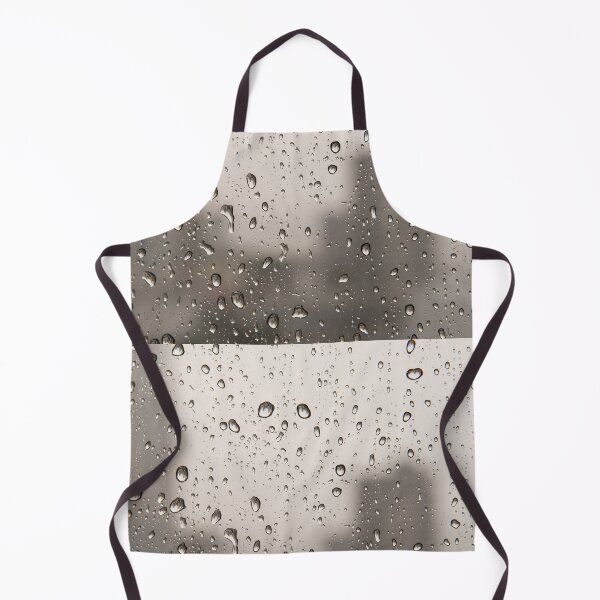 Item preview, Close up of drops of rain water running down clear glass window designed and sold by krisgreenwood.