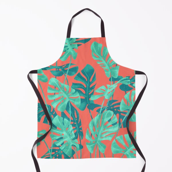 Monstera leaves on living coral. Apron
