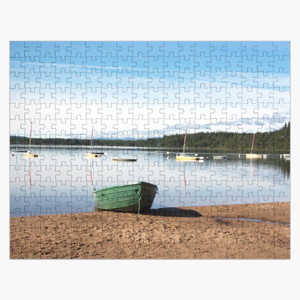 Tranquil loch with a green boat Jigsaw Puzzle