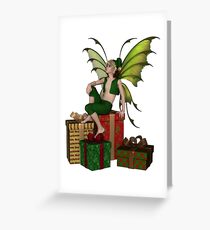 Christmas Fairy Elf Boy Sitting on a Pile of Presents Greeting Card