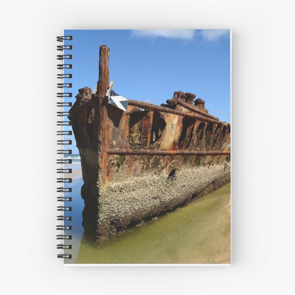 Item preview, Rusty shipwreck on Fraser Island beach with blue sky and whispy clouds. designed and sold by GeorgeLemon.
