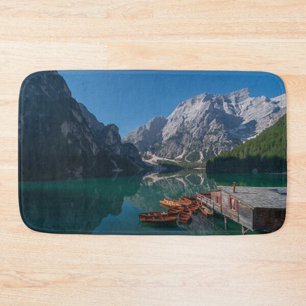 Item preview, The Seekofel mountains and wooden boats reflected in the waters of Lake Braies designed and sold by brambillasimone.