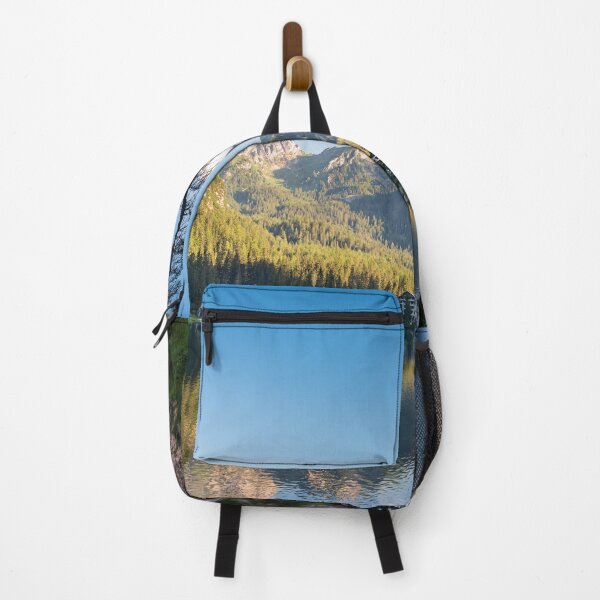 Item preview, A path with a wooden fence climbs steeply beside the Braies lake designed and sold by brambillasimone.