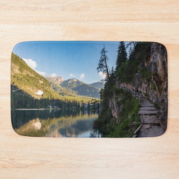 Item preview, A path with a wooden fence climbs steeply beside the Braies lake designed and sold by brambillasimone.