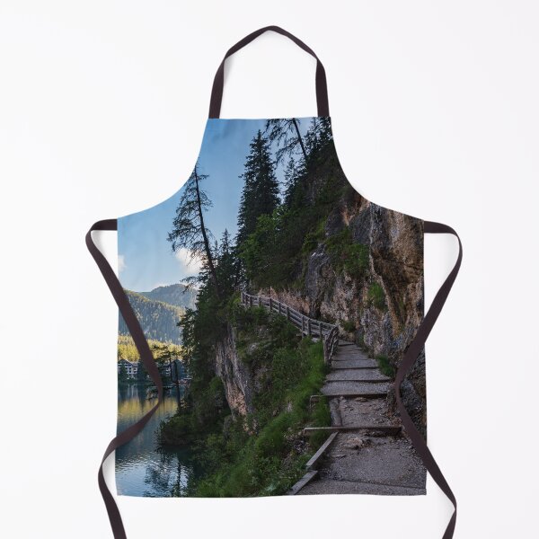 Item preview, A path with a wooden fence climbs steeply beside the Braies lake designed and sold by brambillasimone.