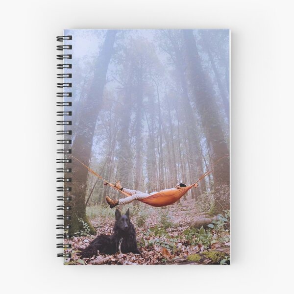 Item preview, young man relaxing with his dog in a rain forest designed and sold by slambob.