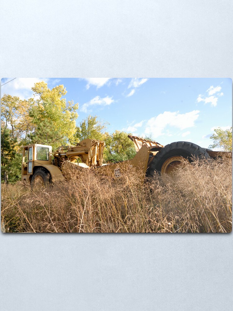 Alternate view of Land Grader parked in the grass Metal Print