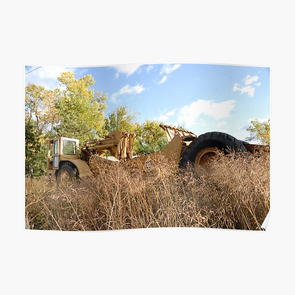 Land Grader parked in the grass Poster