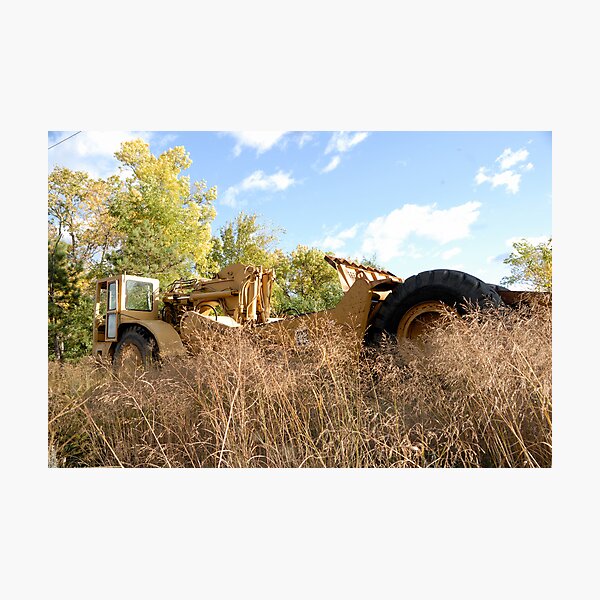 Land Grader parked in the grass Photographic Print