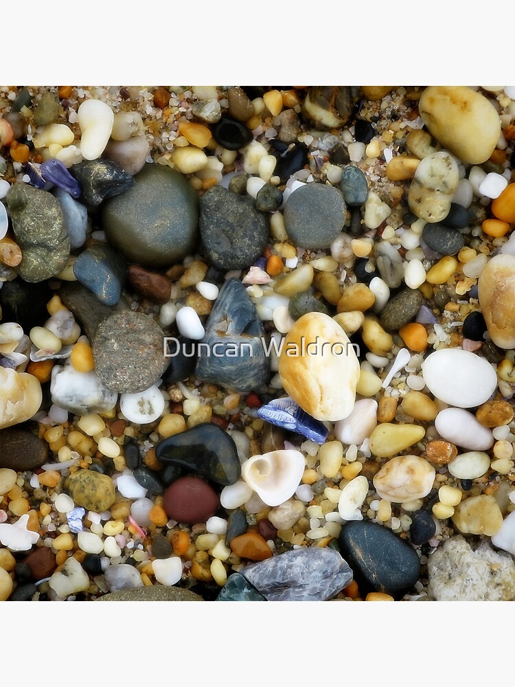 Wet pebbly beach by DuncanW