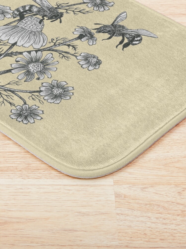 Alternate view of bees and chamomile on honey background Bath Mat