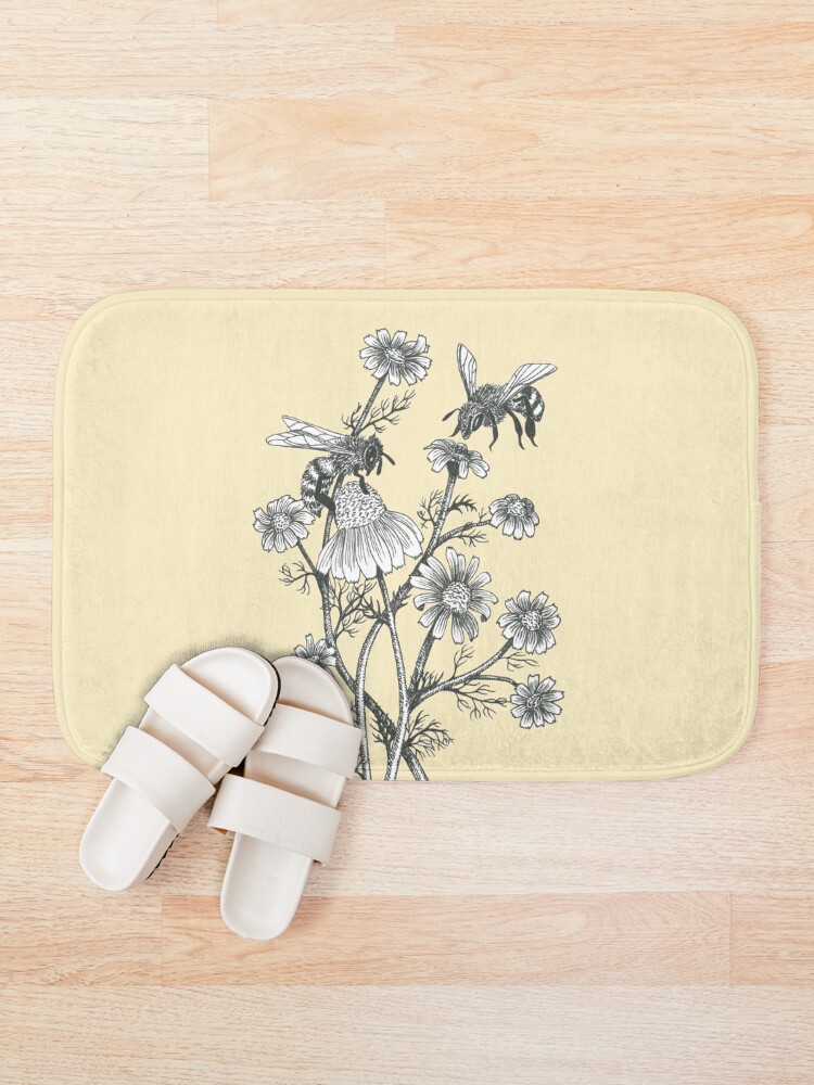 Alternate view of bees and chamomile on honey background Bath Mat