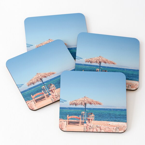 Item preview, natural materials beach umbrella and wooden chairs by the blue sea and the blue sky designed and sold by SherriMans.