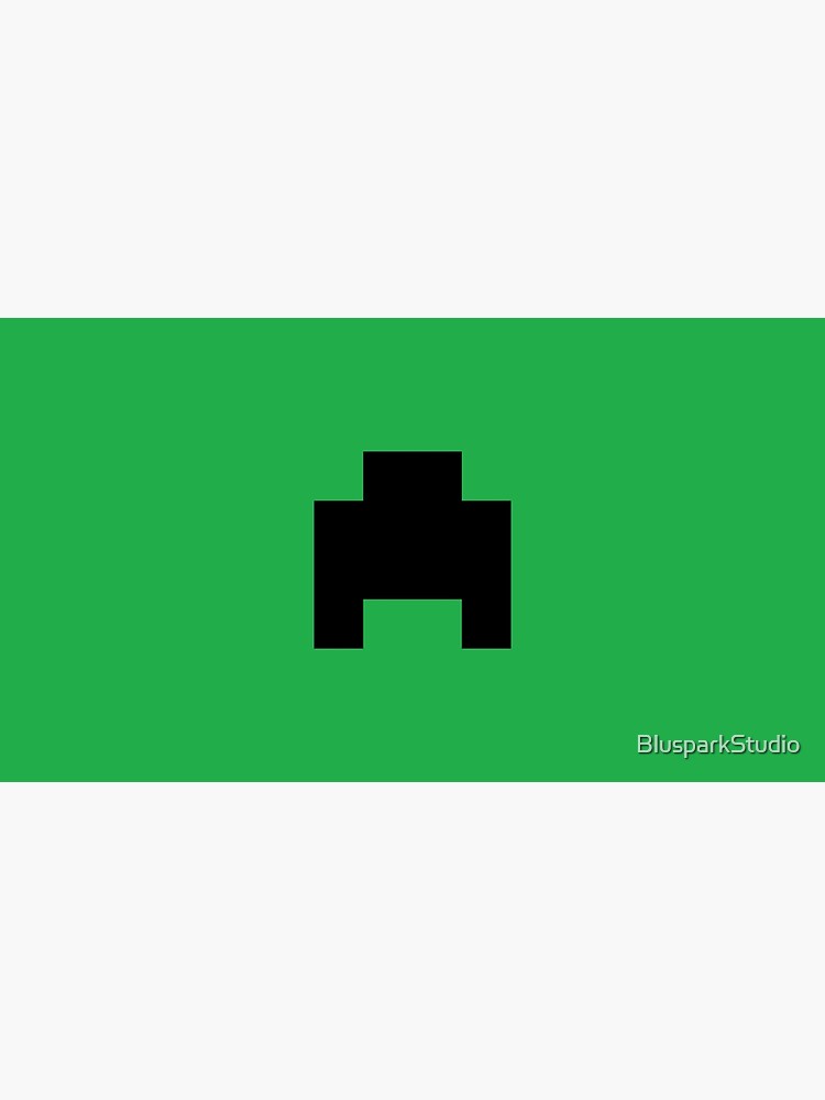 Green minecraft t-shirt with a creeper face design