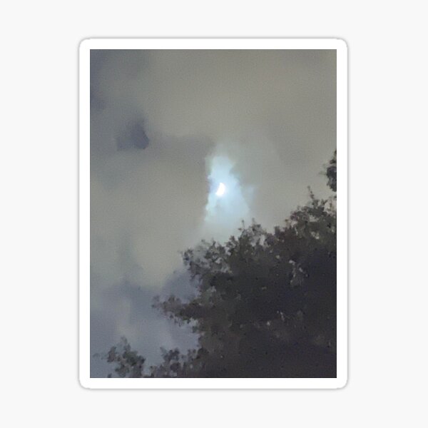 Clouds moving in front of crescent moon Sticker