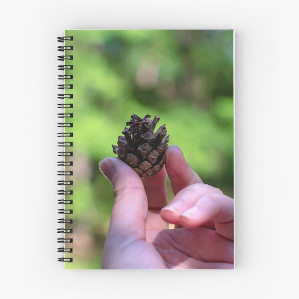 Item preview, Hand holding pine cone designed and sold by lena-maximova.