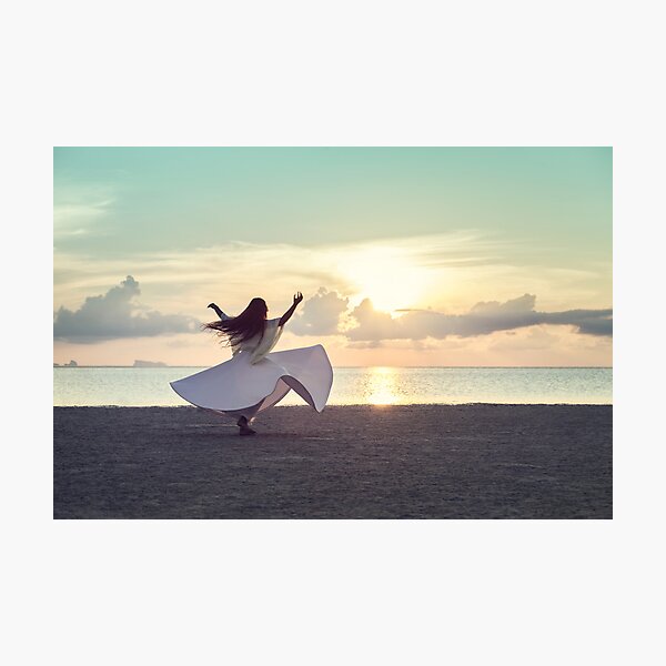 Woman Dancing on the Beach at Sunset Photographic Print