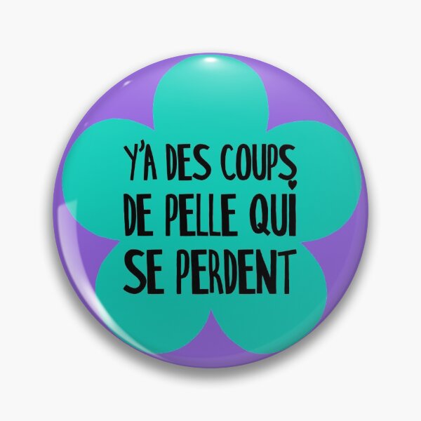 Y'a des coups de pelle qui se perdent (French for "There are shovel blows that get lost"), green flower Pin