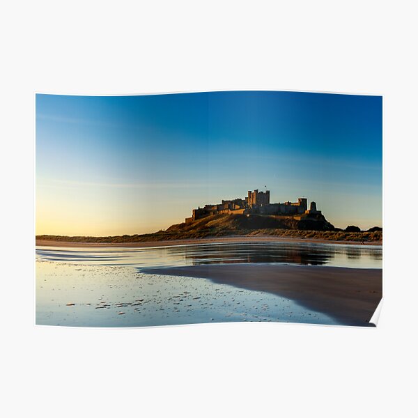 Sunrise over Bamburgh Castle Poster
