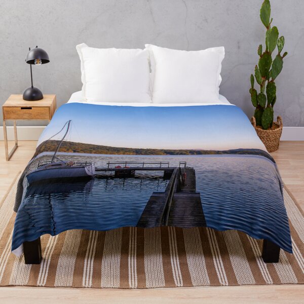 Item preview, Sunrise over Lake Windermere with boat and jetty and clear blue sky designed and sold by HTPOP.