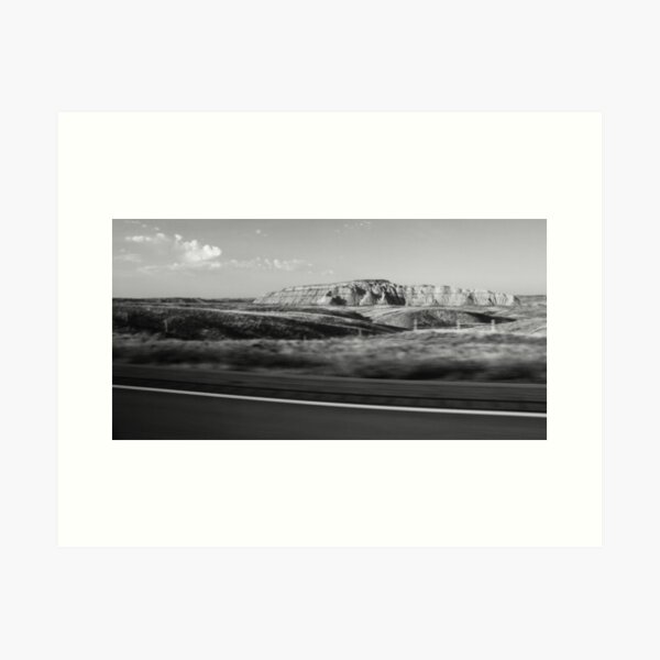 Aperçu de l'œuvre L'Amérique en passant 1/Badlands au lever du soleil 5 créée et vendue par Audrey Farber.
