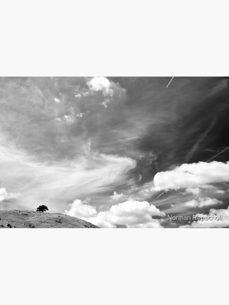 Standing among clouds by keystone