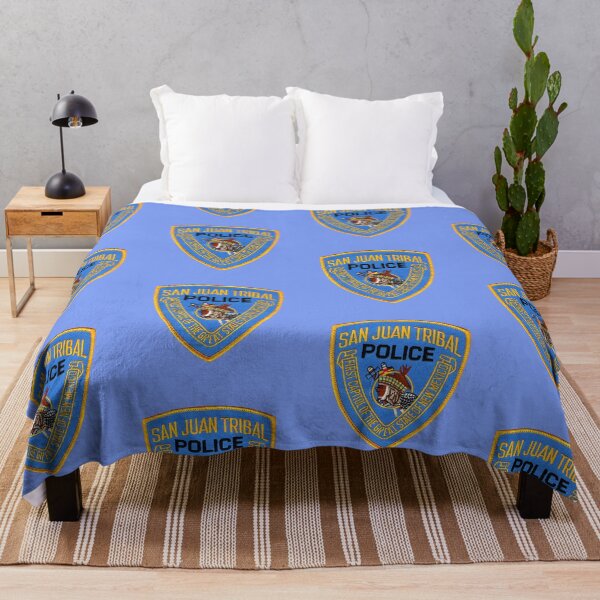 Item preview, San Juan Pueble Police designed and sold by Lawrence Baird.