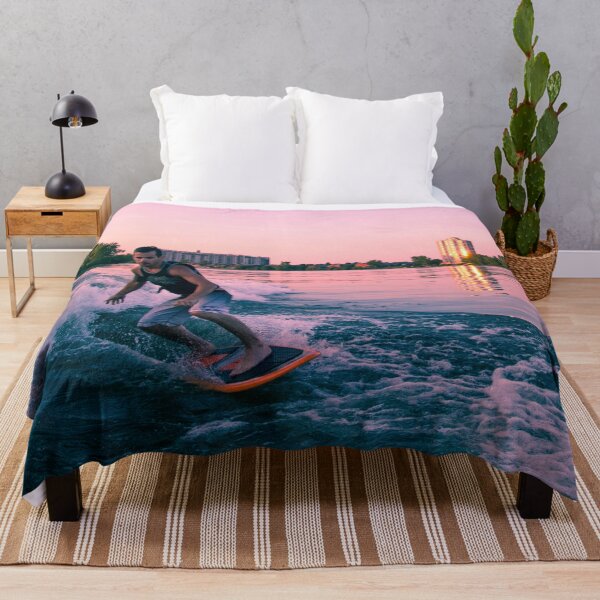 Item preview, Surfing behind a boat at sunset designed and sold by louishay.