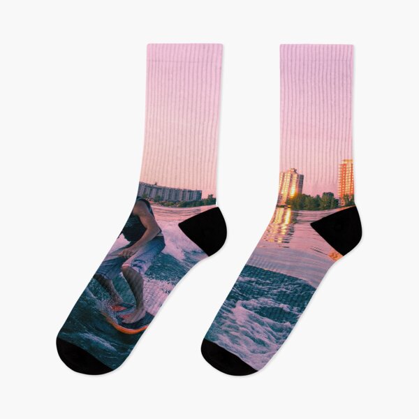 Item preview, Surfing behind a boat at sunset designed and sold by louishay.