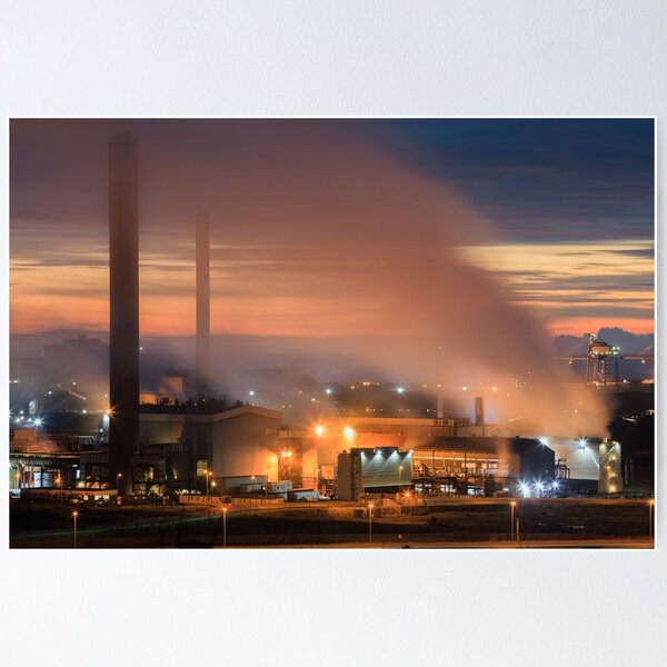 Factory Tata Steel with smoking chimneys on a sunny day, IJmuiden, The  Netherlands Stock Photo