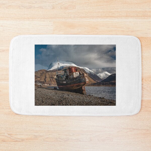 Item preview, Wreckage in the shadows of Ben Nevis's snow-capped mountains designed and sold by Incakola1.