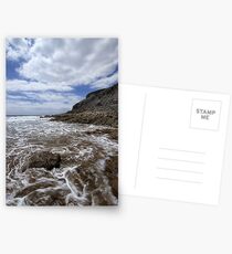 Waves breaking round a rock Postcards