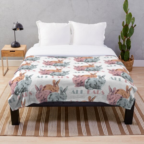 Item preview, Three colorful rabbits on the white background, all ears. designed and sold by korasi.