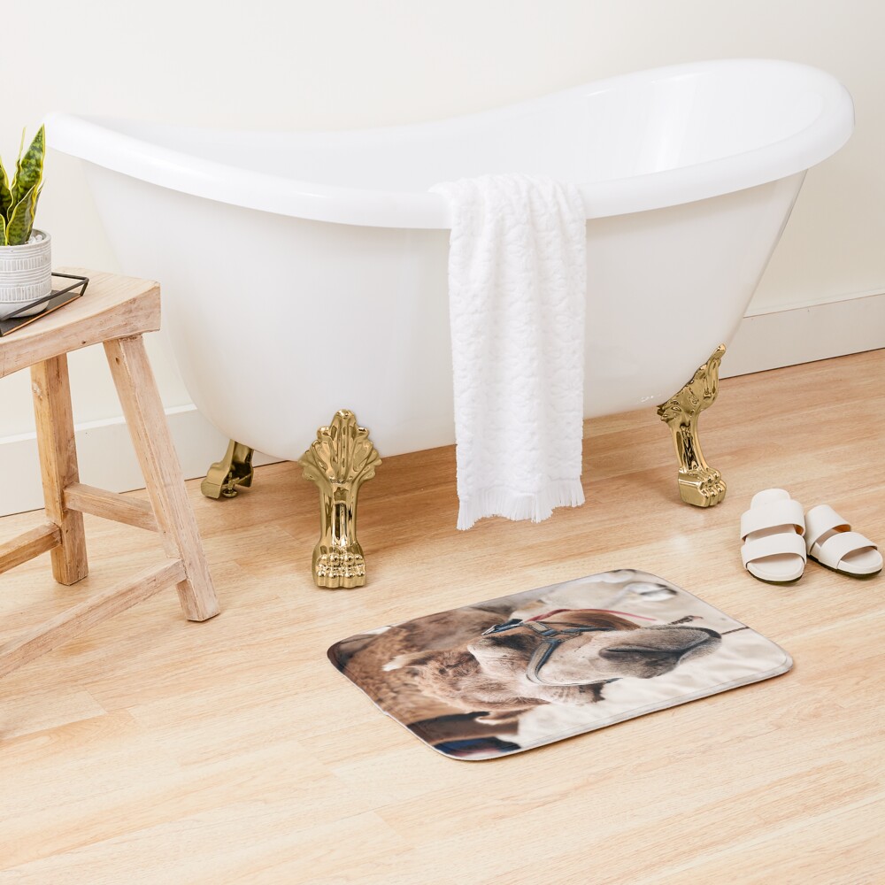 Camel in the desert Bath Mat