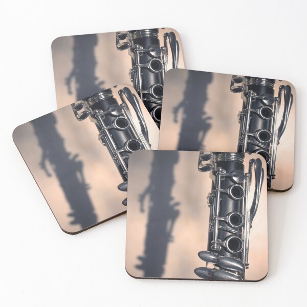 Item preview, Part of a clarinet woodwind musical instrument and its shadow at sunset designed and sold by Grégory DUBUS.