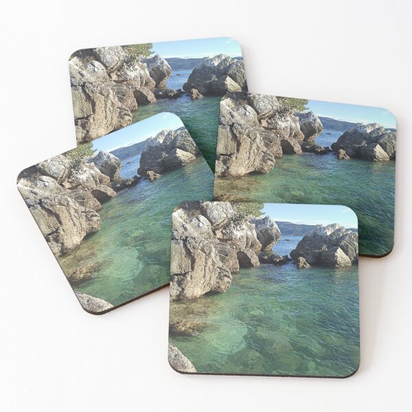 Item preview, huge stones cliff in the sea with cypresses and azure water blue sky nature of montenegro designed and sold by alinalenz.