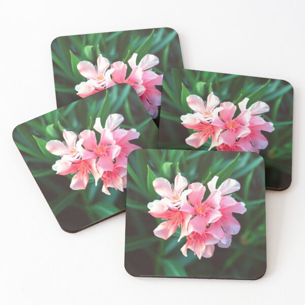 Item preview, Pink Nerium oleander flower against natural green background designed and sold by lena-maximova.
