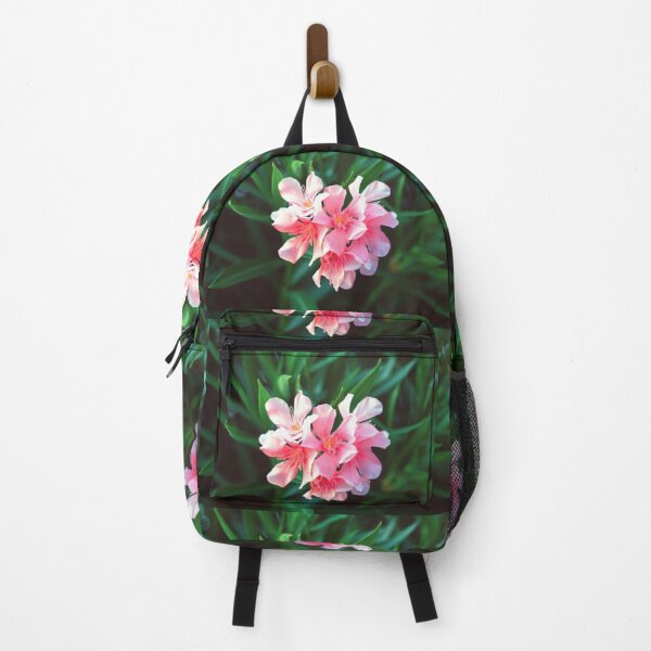 Item preview, Pink Nerium oleander flower against natural green background designed and sold by lena-maximova.