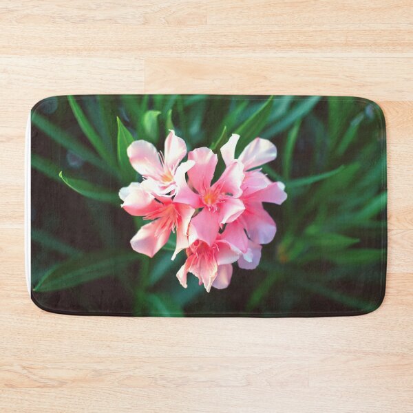 Item preview, Pink Nerium oleander flower against natural green background designed and sold by lena-maximova.