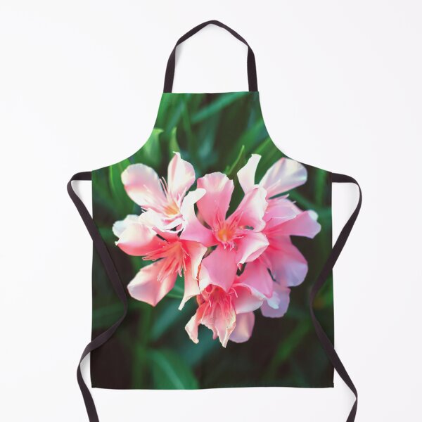 Item preview, Pink Nerium oleander flower against natural green background designed and sold by lena-maximova.