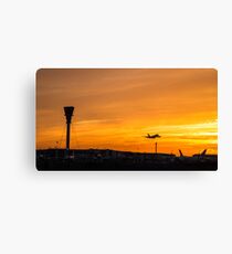 Heathrow airport at sunset Canvas Print