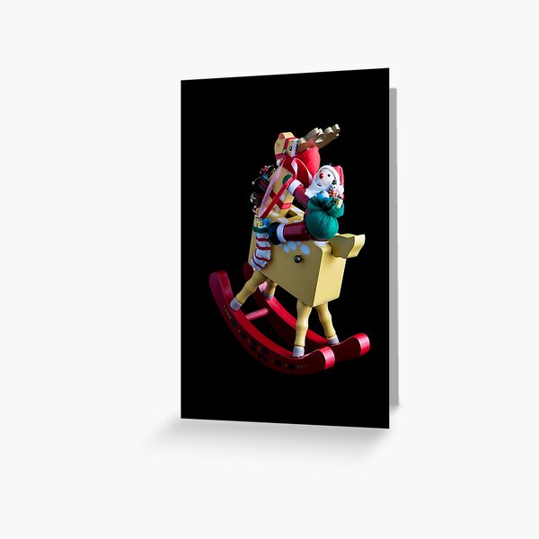 Santa on His Rocking Rednosed Reindeer Greeting Card